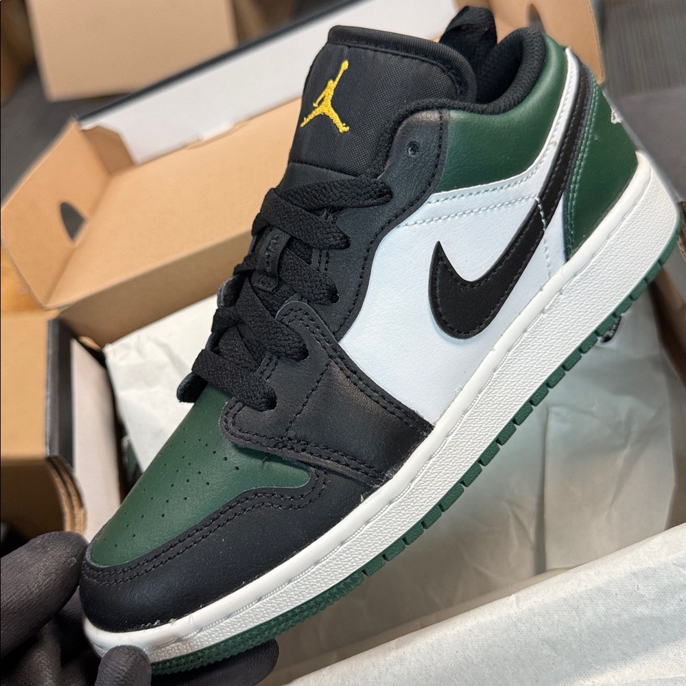 Jordan Kid’s  Black, White, and Green Sneakers